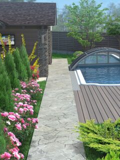 beautiful landscape around pool with arborvitae,pink roses, boxwood and a few other plants.