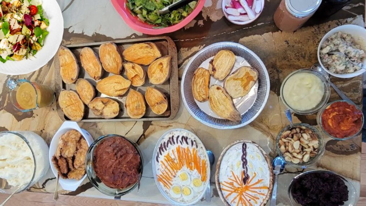 garden potluck: a table full of food made from garden harvest.