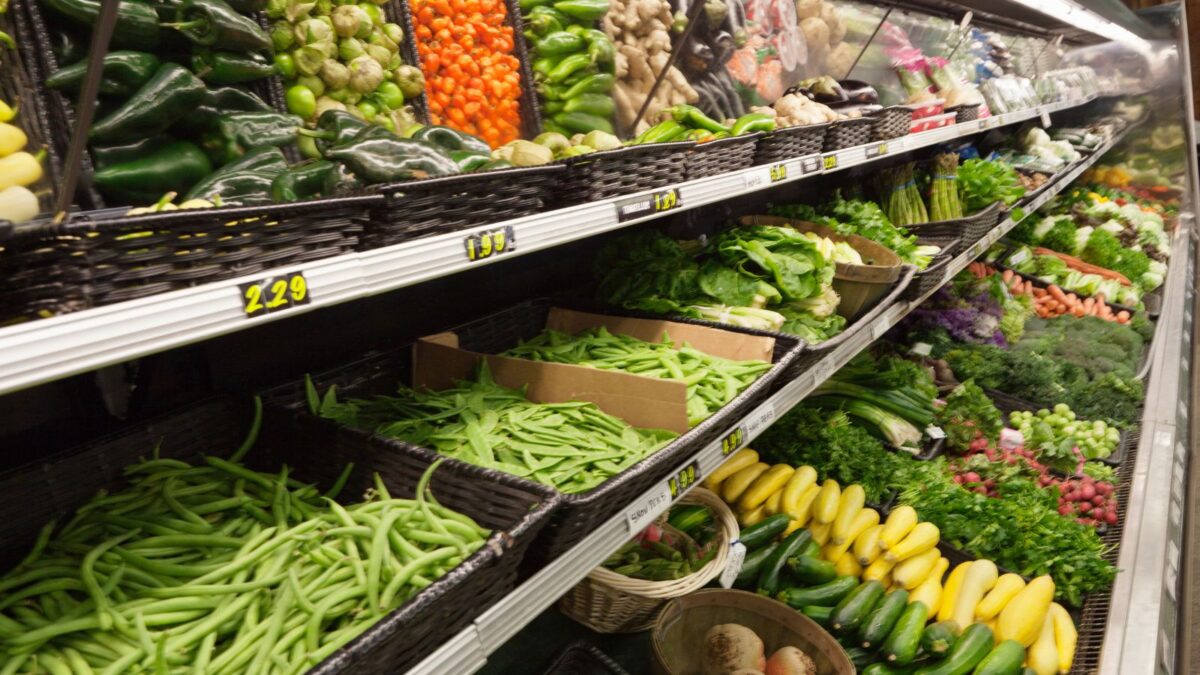fresh vegetables on display at the farmer's market.