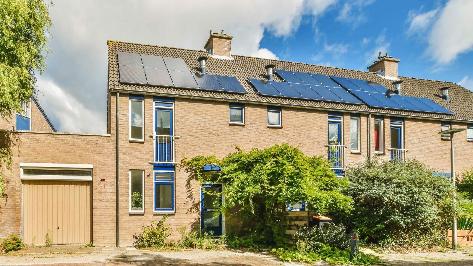 house with solar panels on the roof.