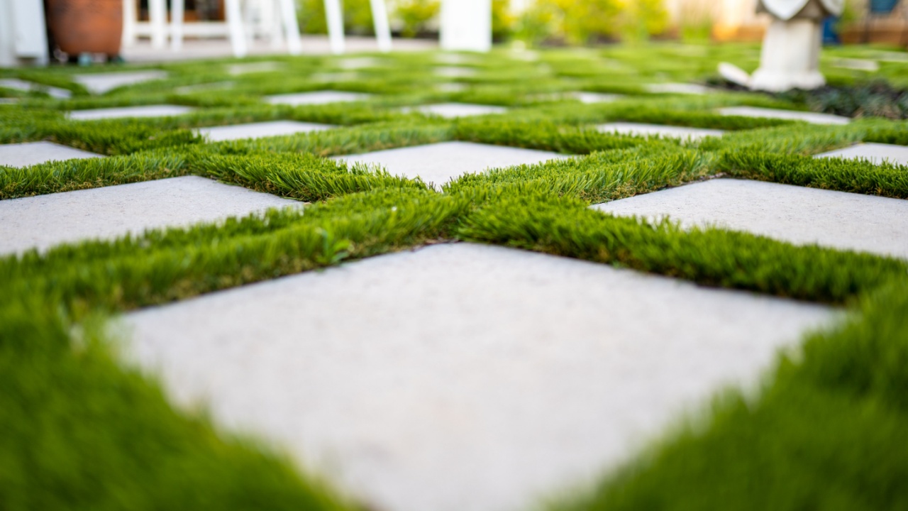 astro turf between concrete pavers