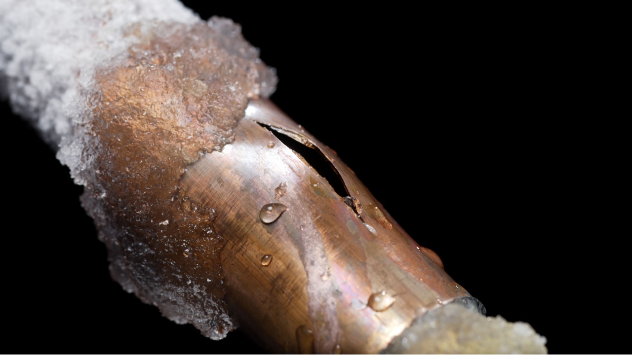 A pipe showing freeze damage