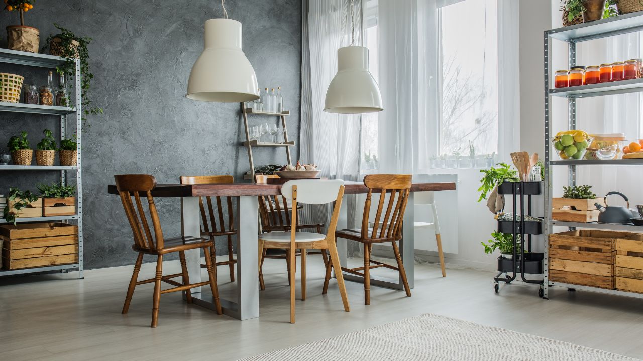 Cozy loft with dinning table, chairs and metal storage racks