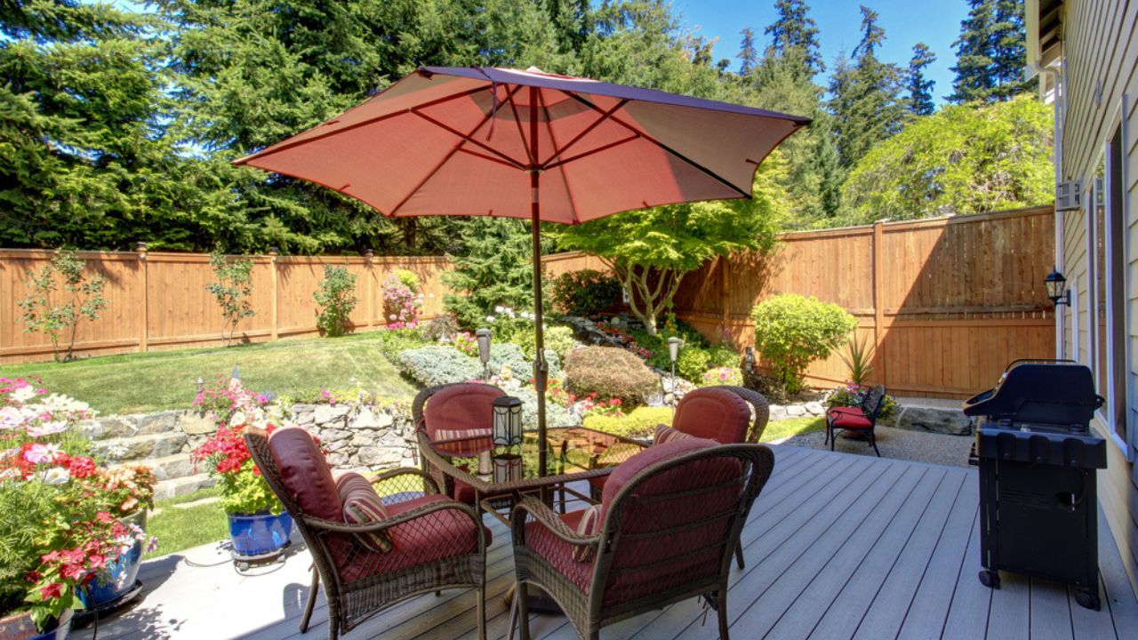 Beautiful landscape design for backyard garden and patio area on walkout deck