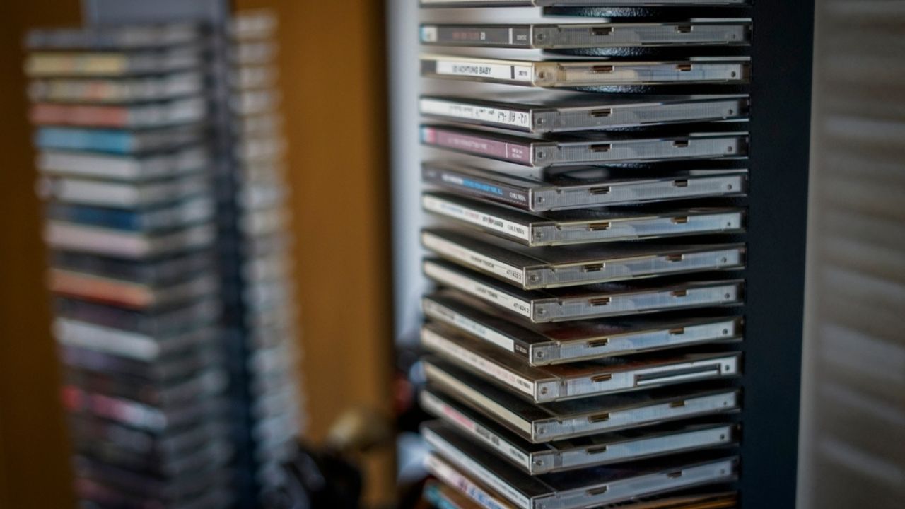 Large number of music CDs in a CD rack test tower