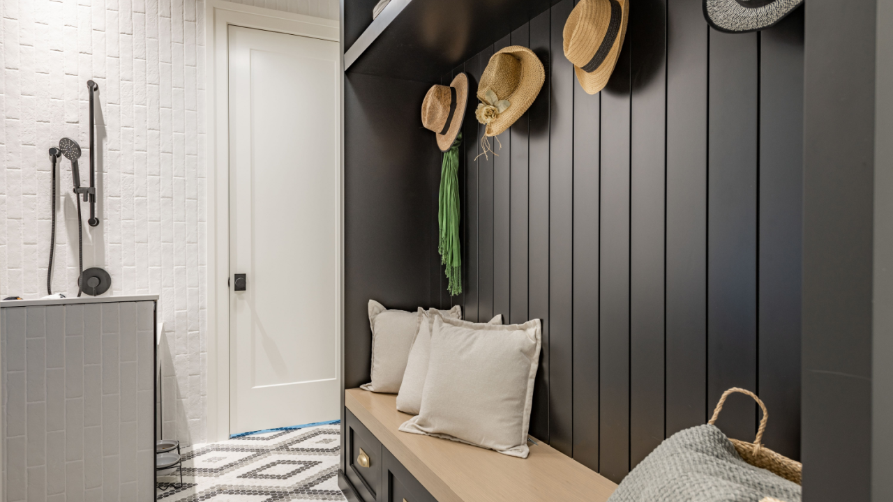 mud room with hats and shower pillows