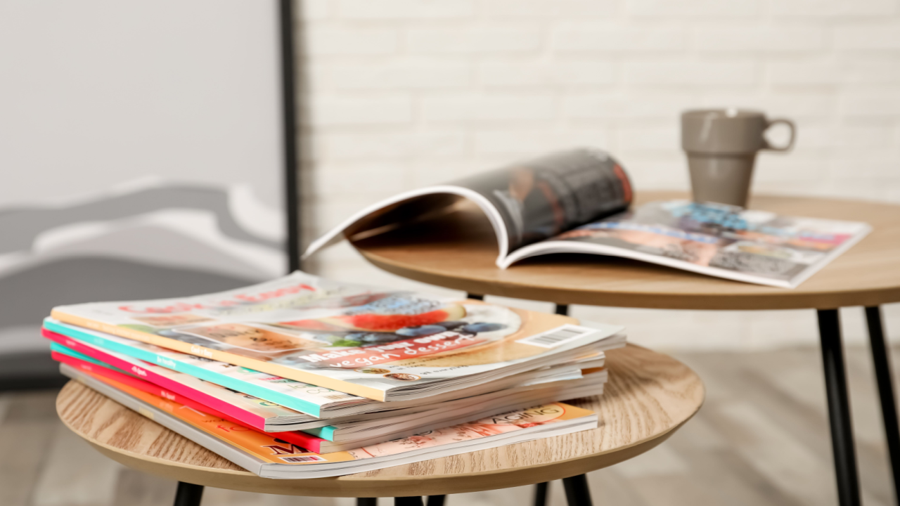 pile of magazines on the coffee table