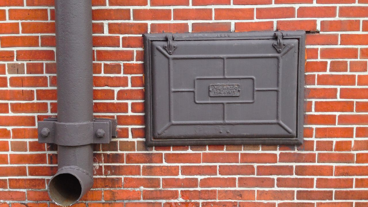 A coal chute made by Majestic in 1926. This example is in an alley near the French Museum in Kankakee, Illinois.