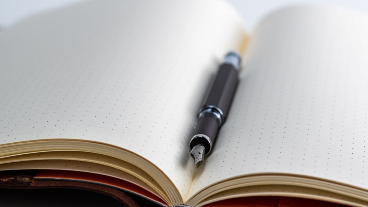 Blank book with pen pencil and ruler with ink, taking notes, fountain pen, planner