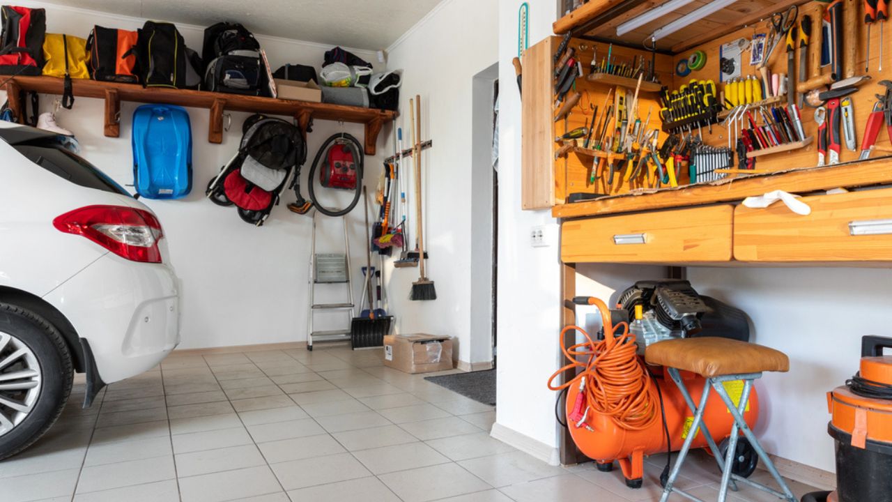 Home suburban car garage interior with wooden shelf, tools equipment stuff storage warehouse Vehicle parked DIY workbench