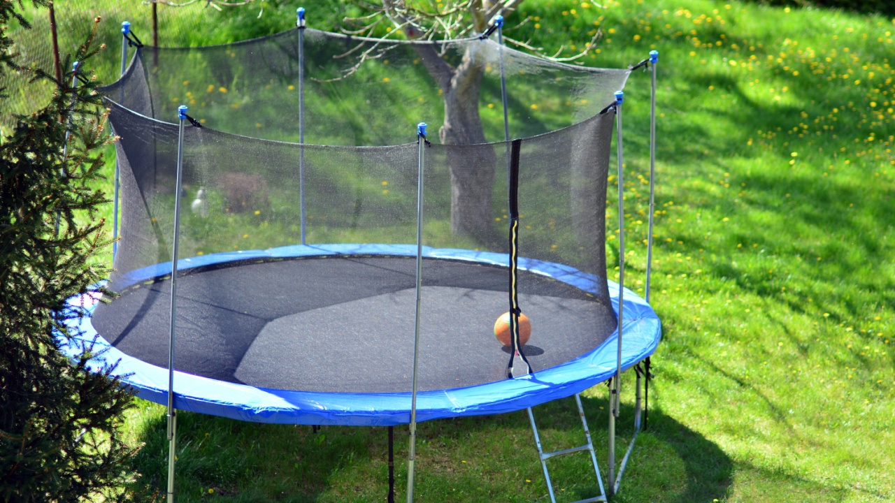 Big trampoline for children and adults. Outdoor Trampoline with safety net with Zipper entrance.
