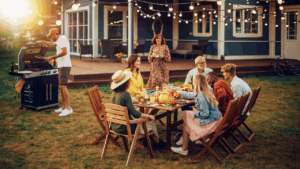 family backyard bbq porch with cozy light strings