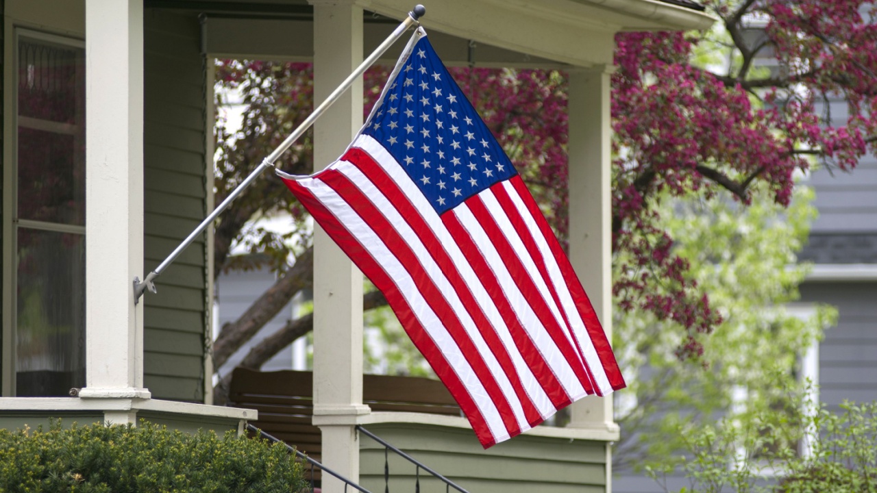 An American flag out in the spring time.