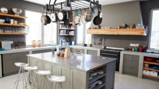 Kitchen Area Of Modern Home Interior With Island And Appliances