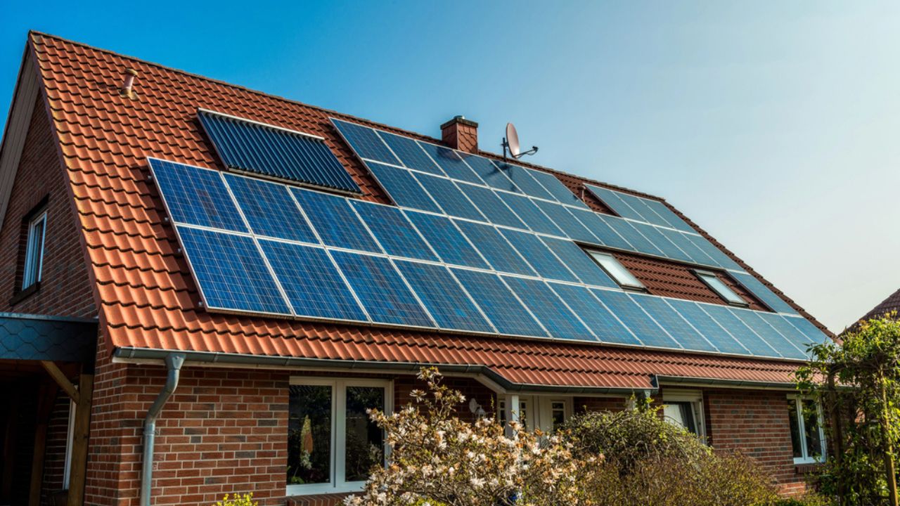 Solar panel on a red roof