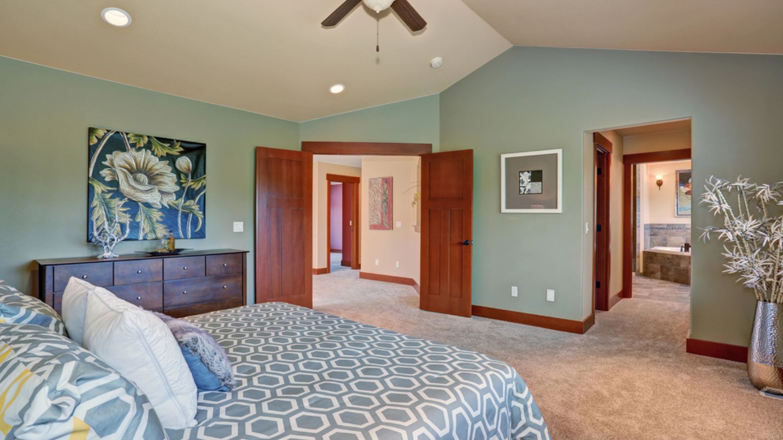Large bedroom with green interior.