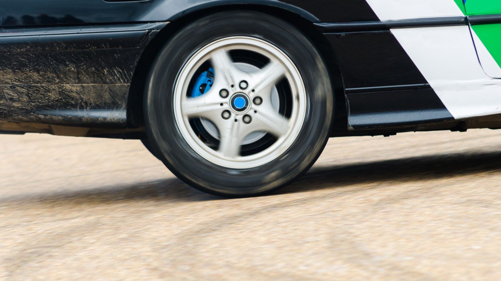 Rear Wheel drive car burning tire for warm up