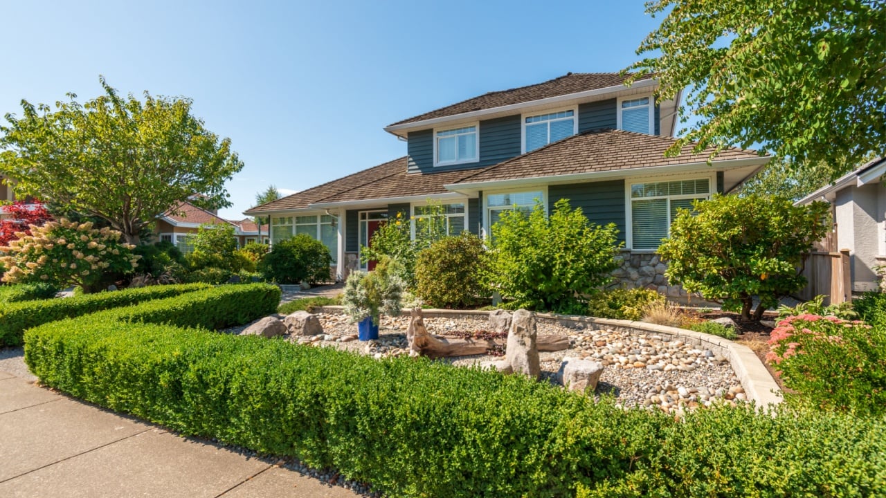 A perfect neighbourhood. Houses in suburb at Summer in the north America. Luxury houses with nice landscape.