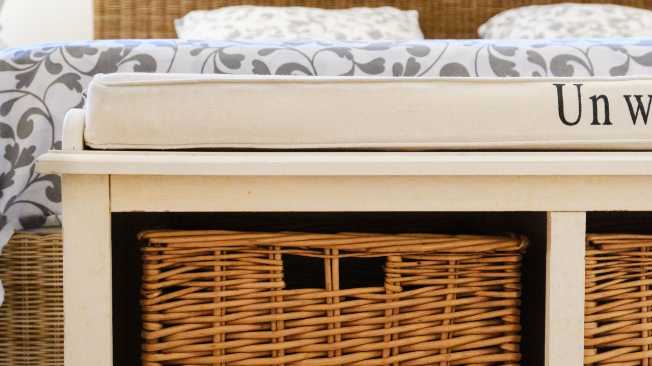 Handcrafted woven storage basket from natural wood rods, perfect for under-bed storage. Adds rustic charm to any room while keeping essentials like clothes, linens, or toys neatly organized and easily