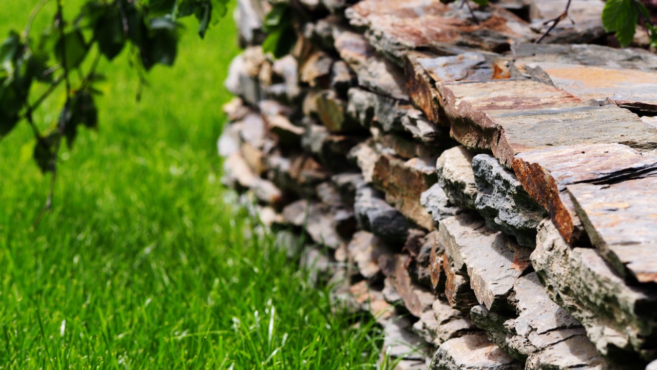 Slate garden wall. Garden stone wall. 