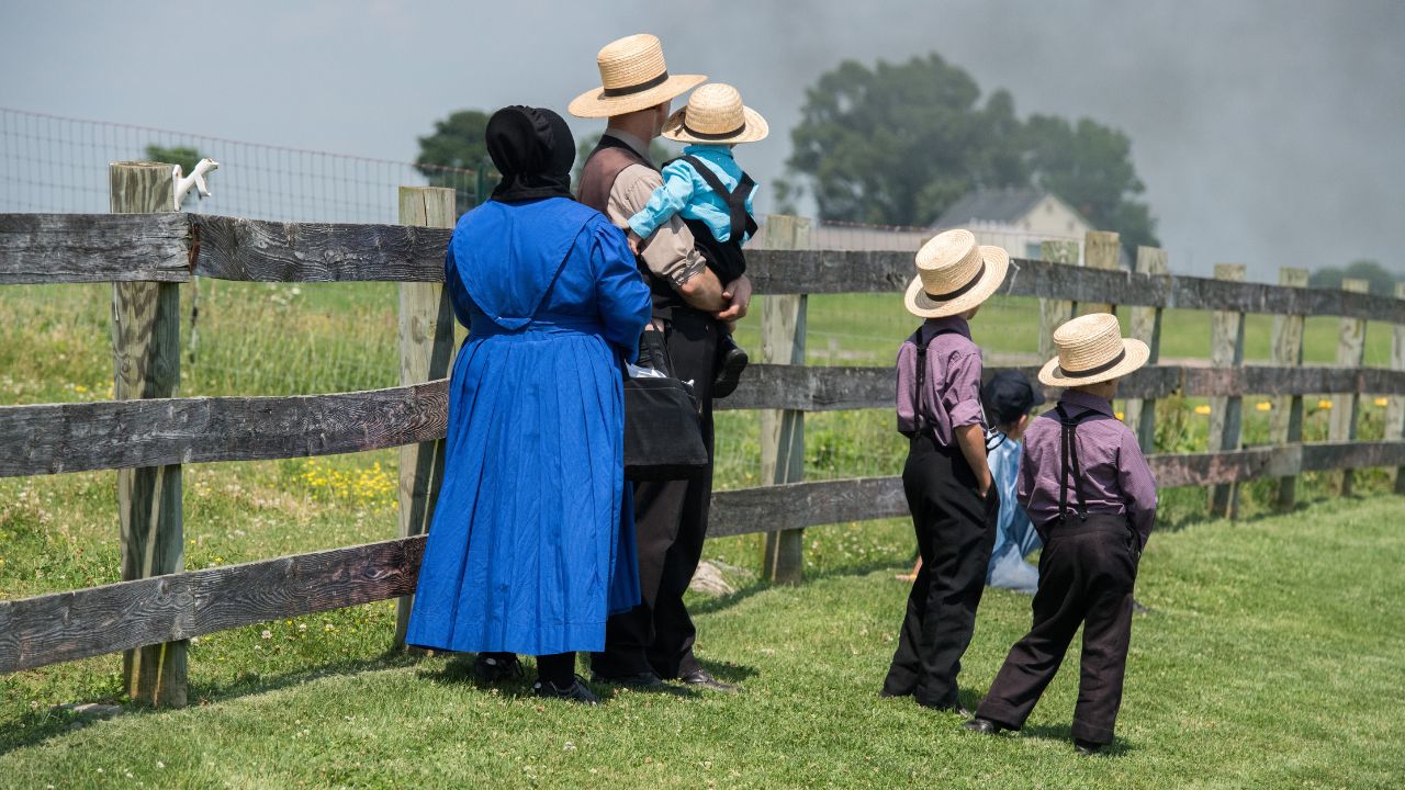 Amish people in Pennsylvania. Amish are known for simple living with touch of nature contacy, plain dress, and reluctance to adopt conveniences of modern technolog