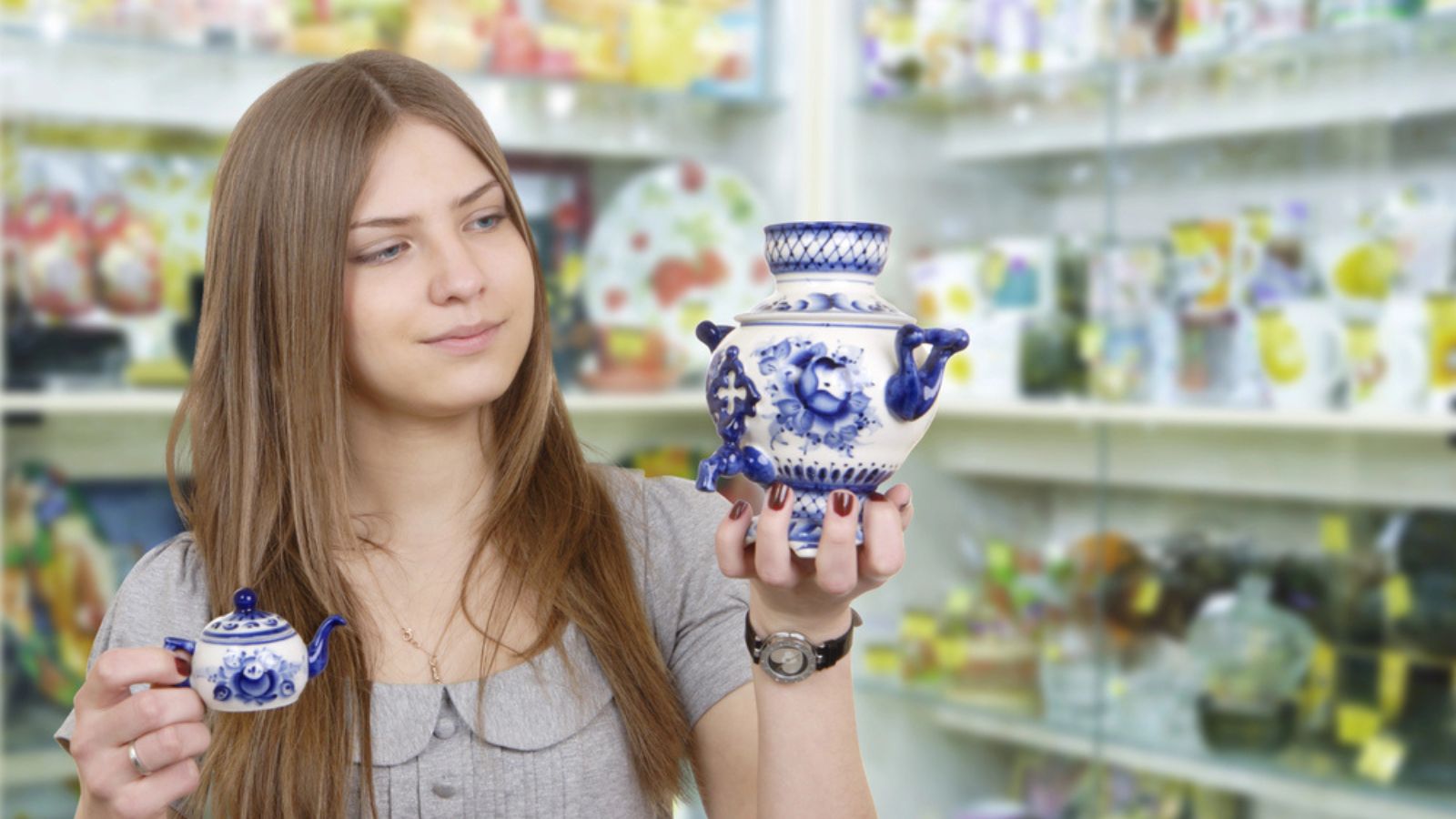 Woman buying household porcelain on a store
