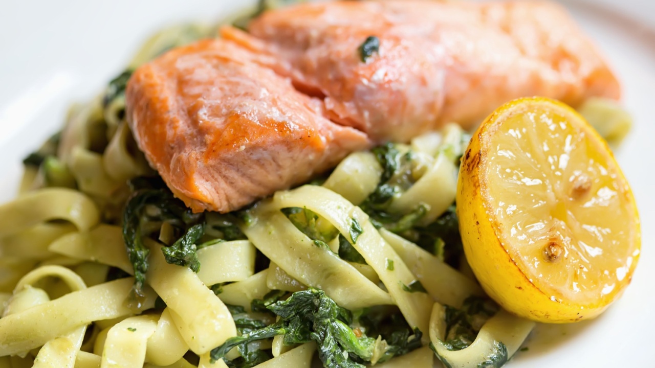 Grilled atlantic salmon fillet, with a fresh pasta salad.