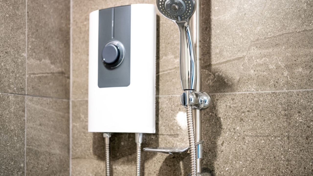 Shower and electric water heater in the bathroom
