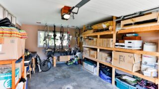 Squamish, British Columbia, Canada - April 2, 2016: An organized indoor house garage storage filled with personal stuff and junk stacked on shelves.