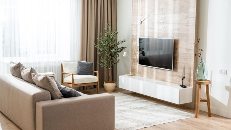 Living room in a modern apartment with a convenient arrangement of furniture