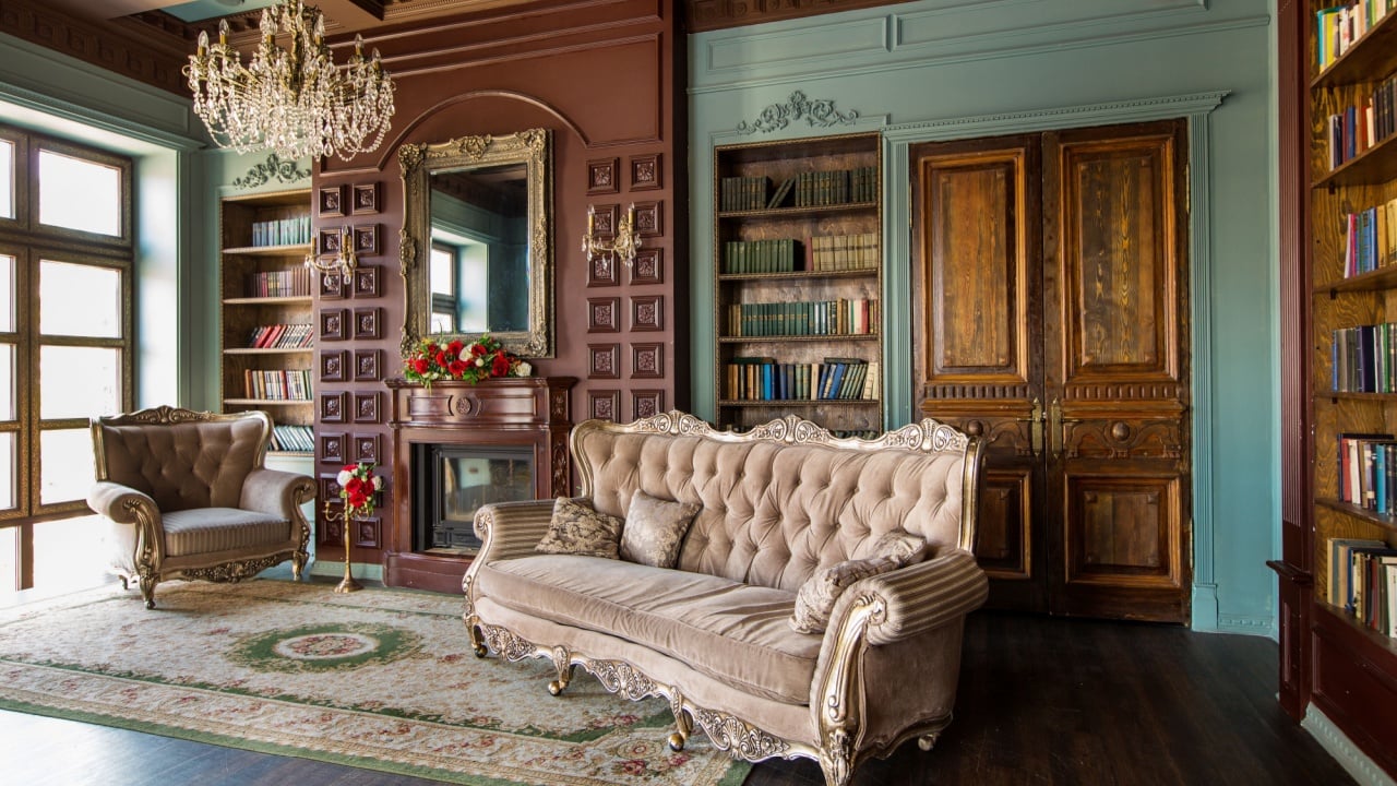 Luxury interior of home library. Sitting room with elegant furniture