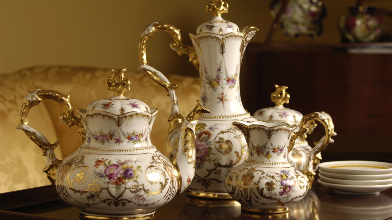 an antique china tea set on a table