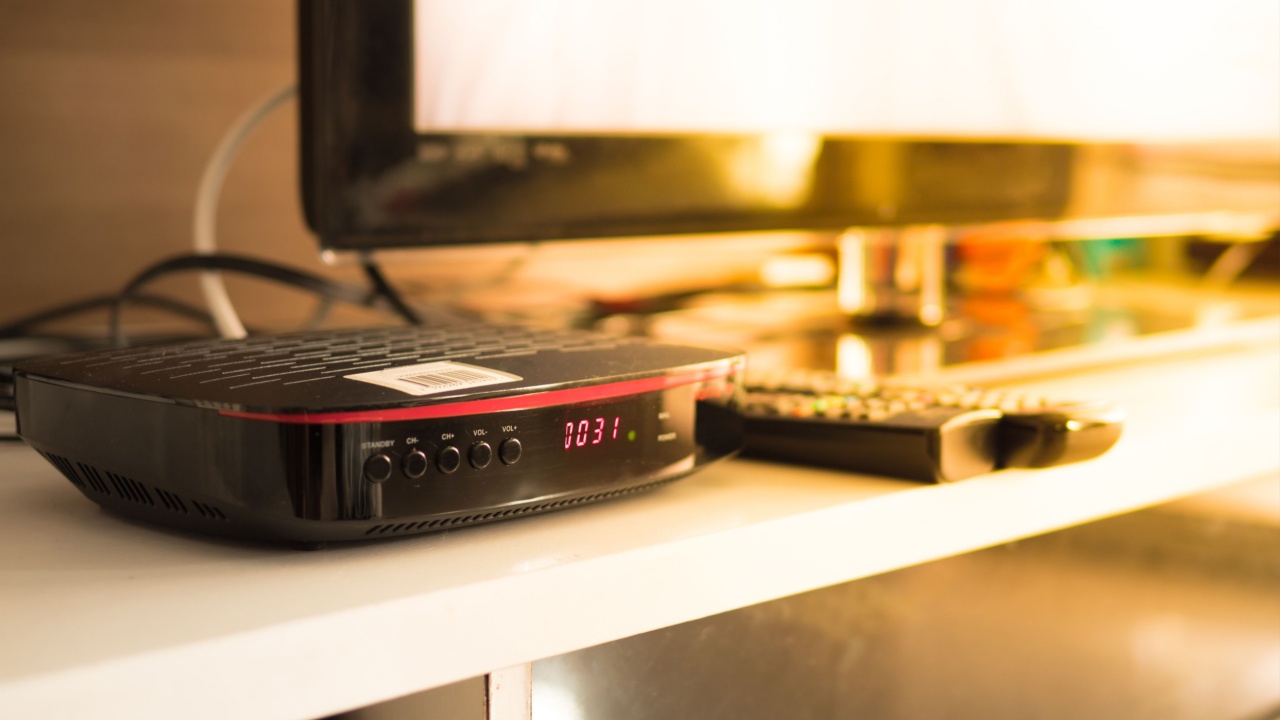 Digital TV box and Smart TV in living room with sun light in the morning