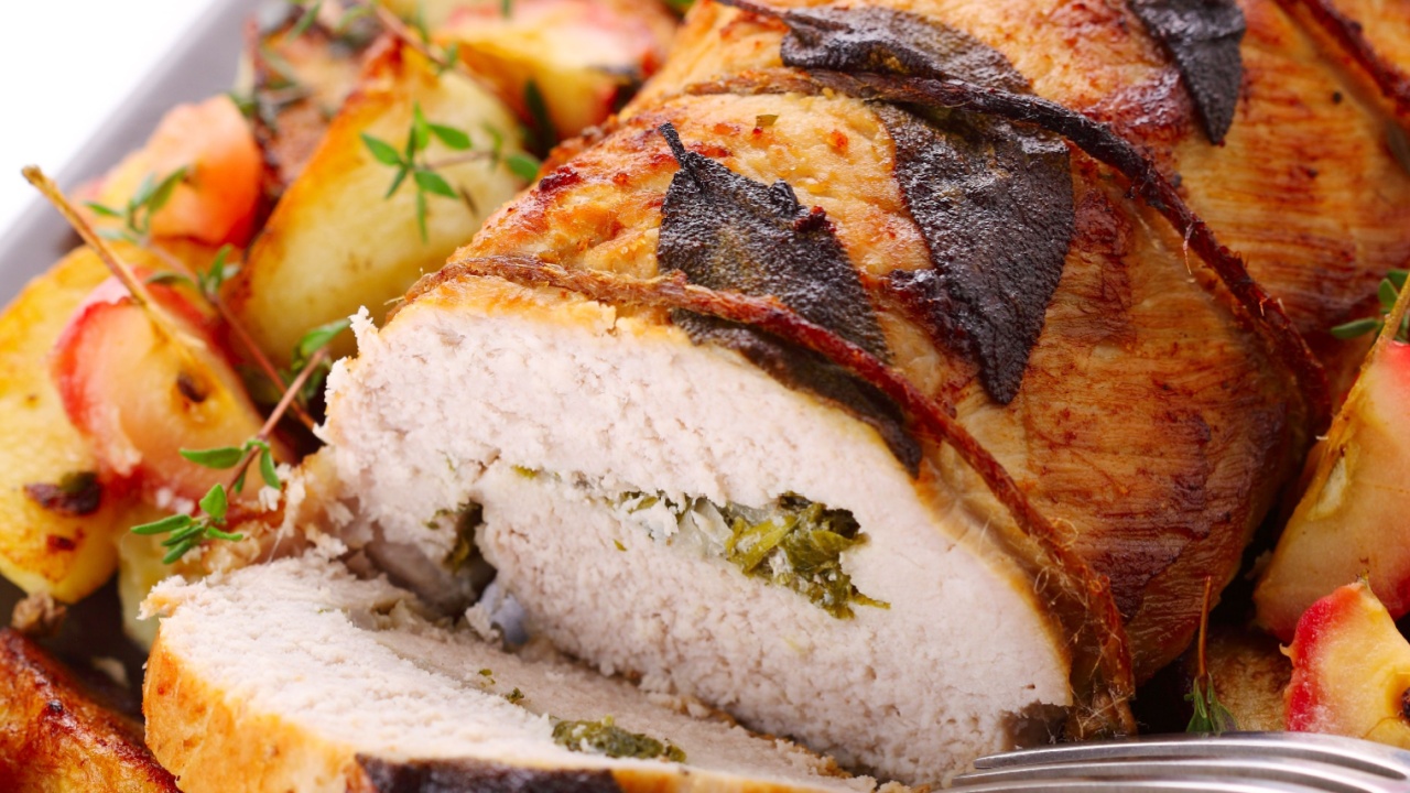 Roast pork with sage and thyme sauteed potatoes and spiced apple sauce