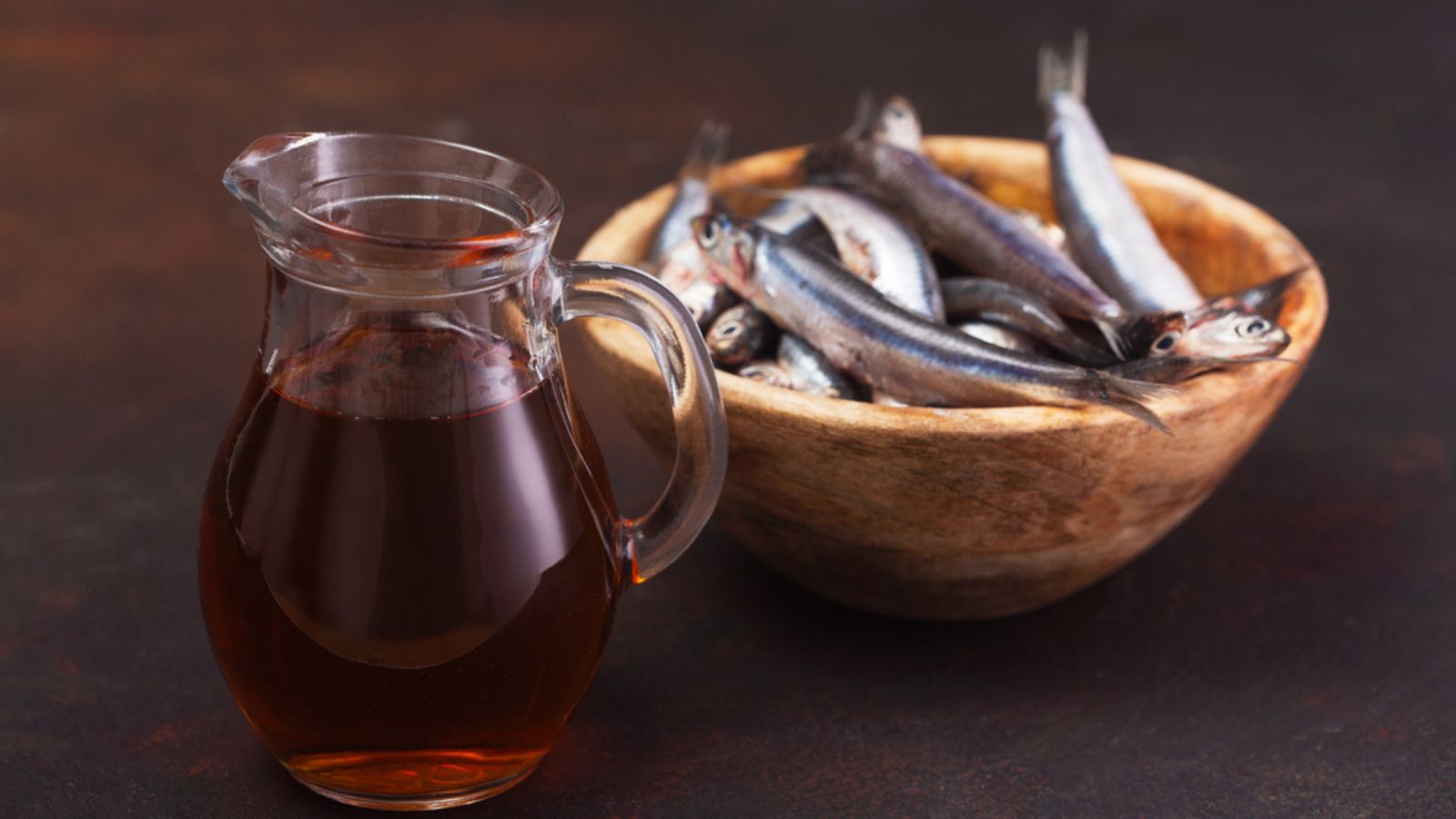 Garum-fish-sauce-made-from-anchovies-on-the-dark-background