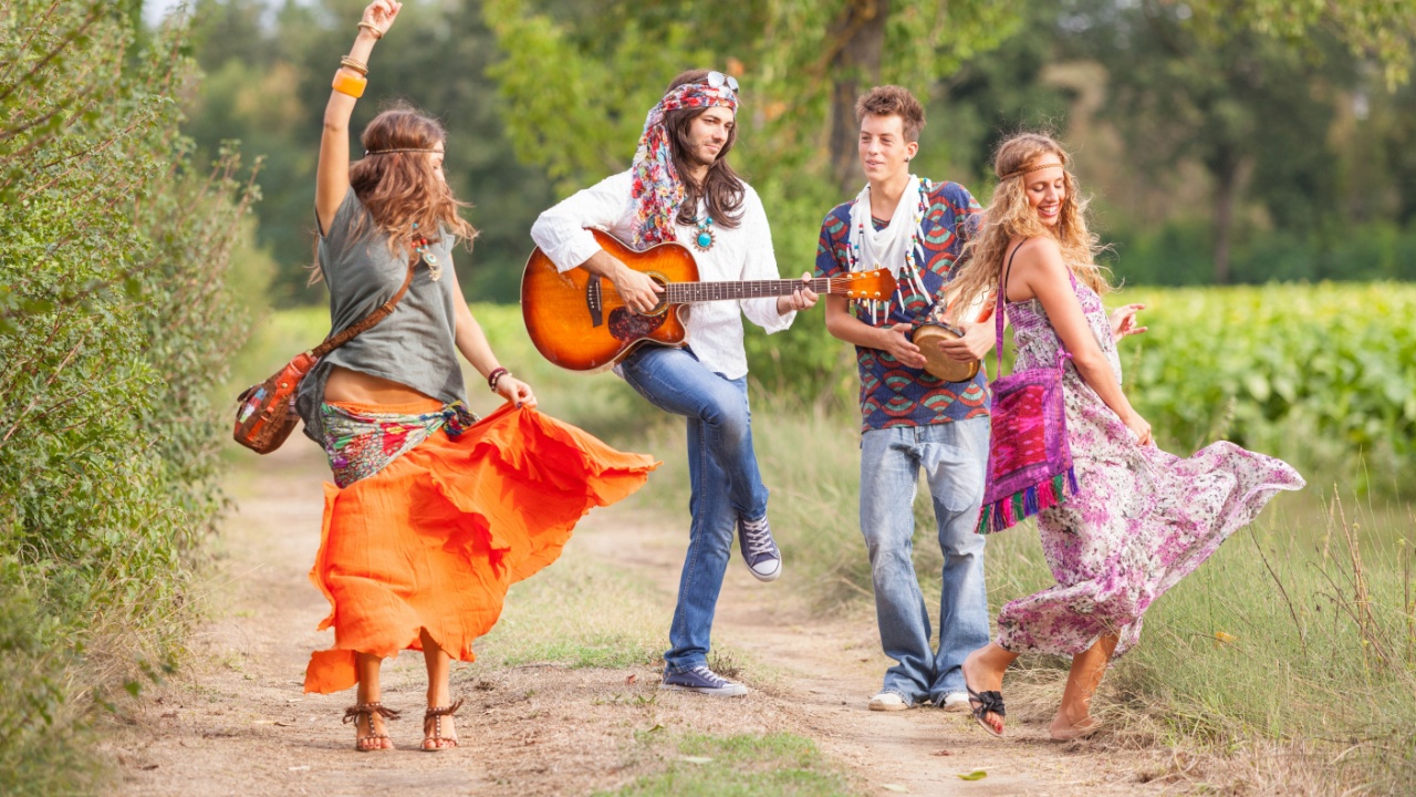 Hippie Group Playing Music and Dancing Outside