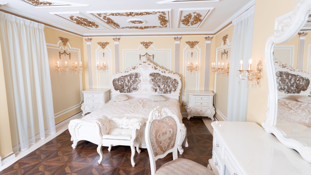 small luxury bedroom with bath and expensive furniture in a chic old baroque style.
