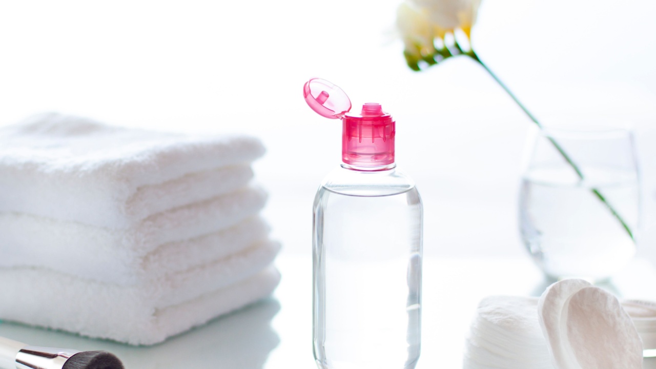 Cleansing face or make up remover cosmetic bottle in the bathroom concept close up
