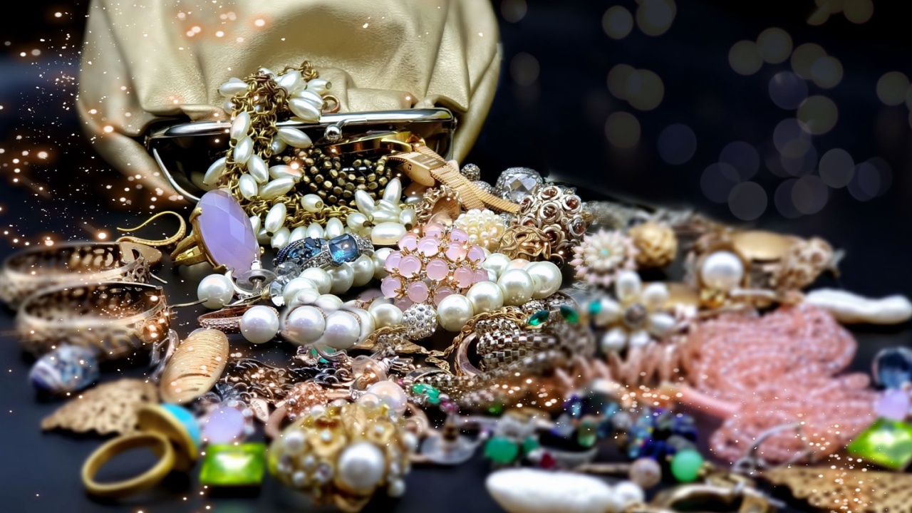 jewelry costume gemstone emerald opal crystal pearl vintage silver, gold rings earrings necklace bracelets on black background cosmetic case 