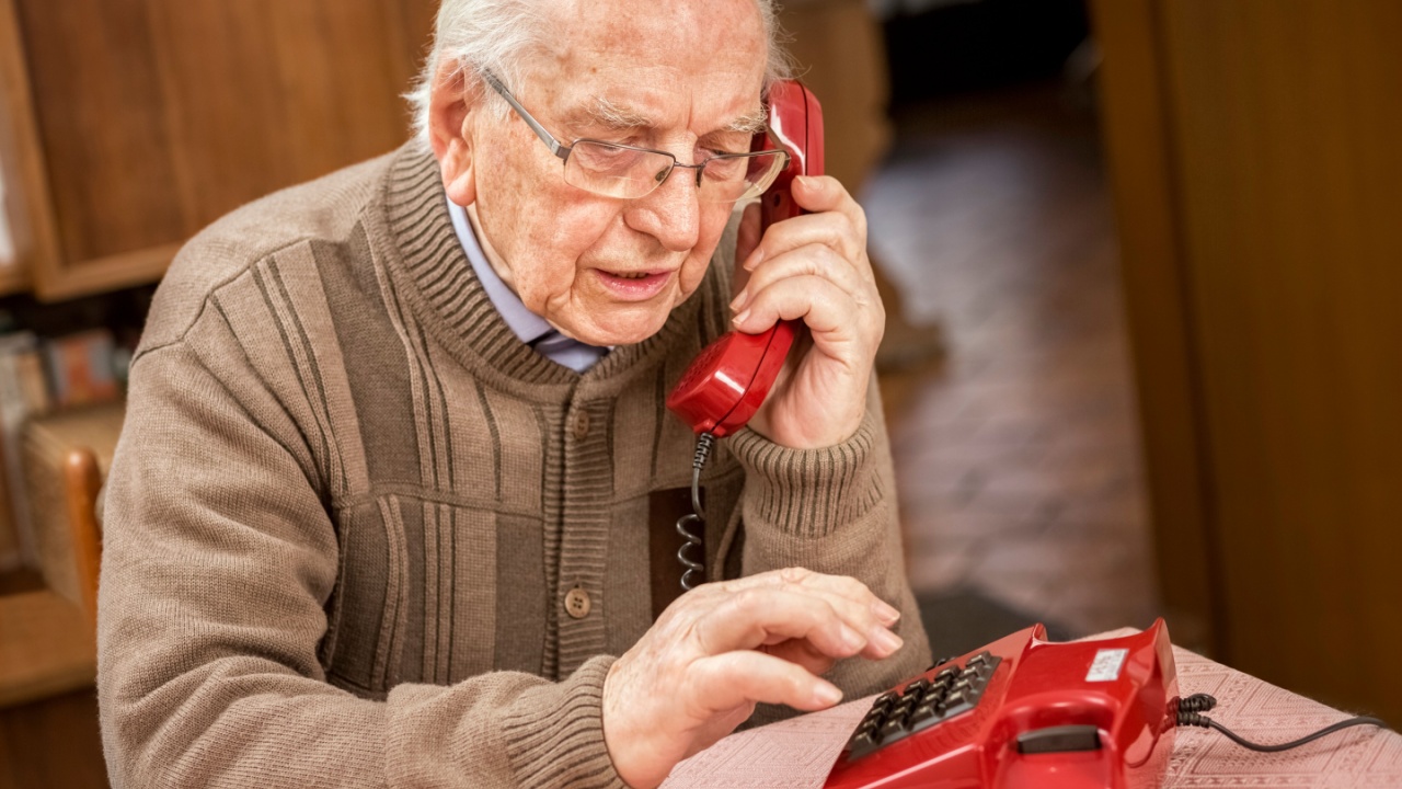 Grandfather with Old Red Button Telephone