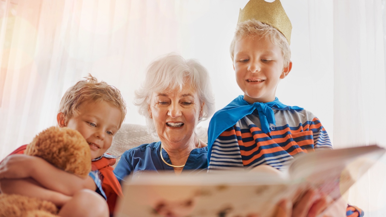 Granny is reading our favorite story again. Shot of a senior woman spending time wither her grandsons.