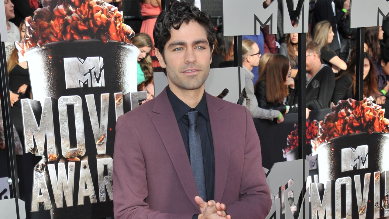 LOS ANGELES, CA - APRIL 13, 2014: Adrian Grenier at the 2014 MTV Movie Awards at the Nokia Theatre LA Live.