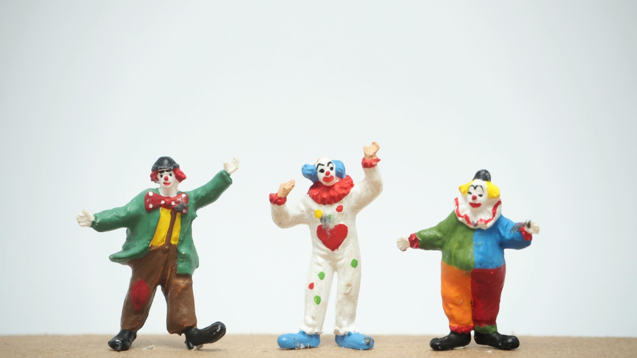 Miniature toy at table with white background.