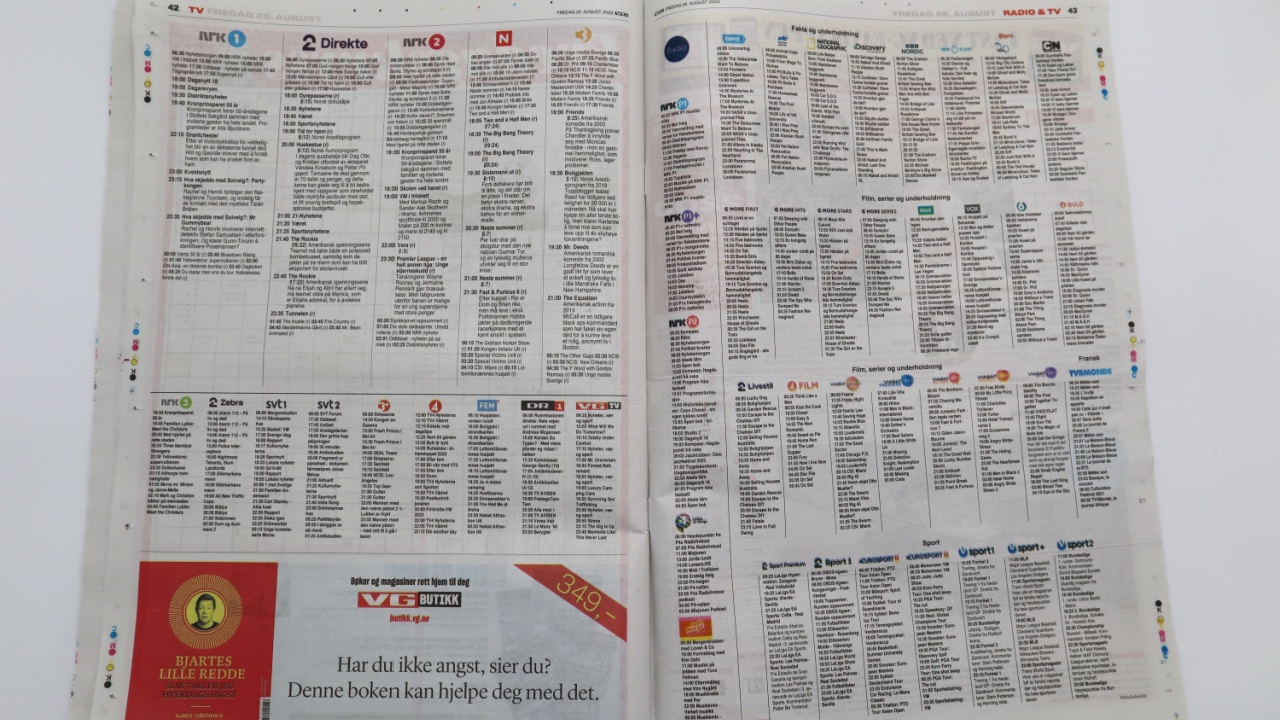 Kongsvinger, Norway 25 august 2023: Updated VG newspaper magazine article with TV guide information for diverse channels in newsstand store shop in Norwegian jourmalism and context