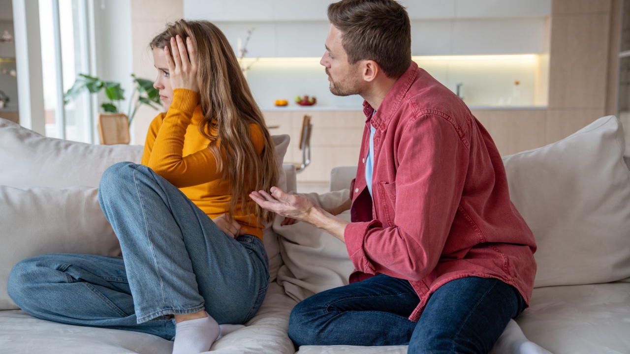 Displeased woman manipulator ignoring husband wanting to talk. Frustrated wife abuser creates toxic atmosphere in family couple. Domestic emotional stress, misunderstanding, relationship problems.