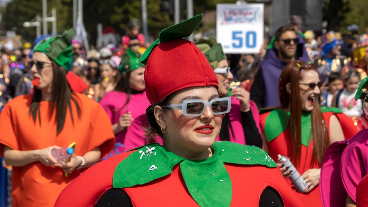 Limassol, Cyprus, March 10th, 2024: Woman in strawberry costume taking part in Carnival Parade 