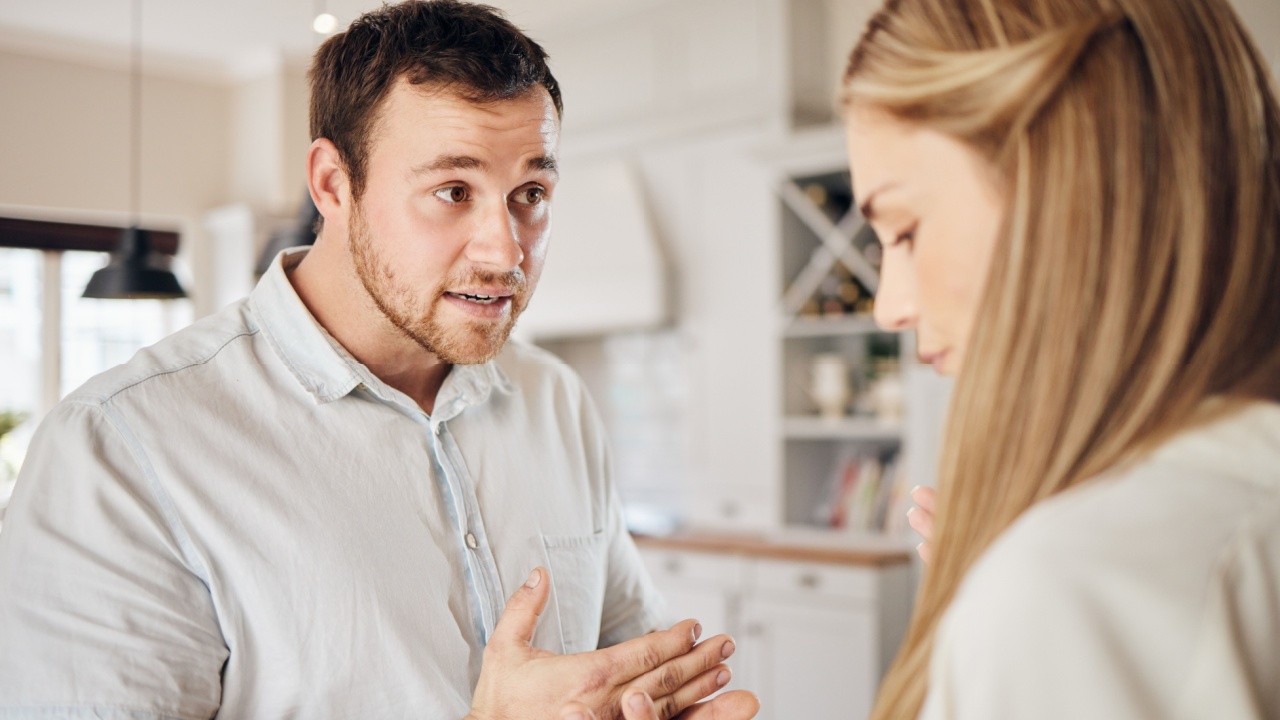 Argument, fight and couple talking for divorce, conflict and disagreement for marriage crisis. Home, argue and frustrated man and woman in discussion for breakup, toxic relationship and affair