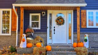 Halloween home decor. Preparing the house for Halloween, decorating with pumpkins.