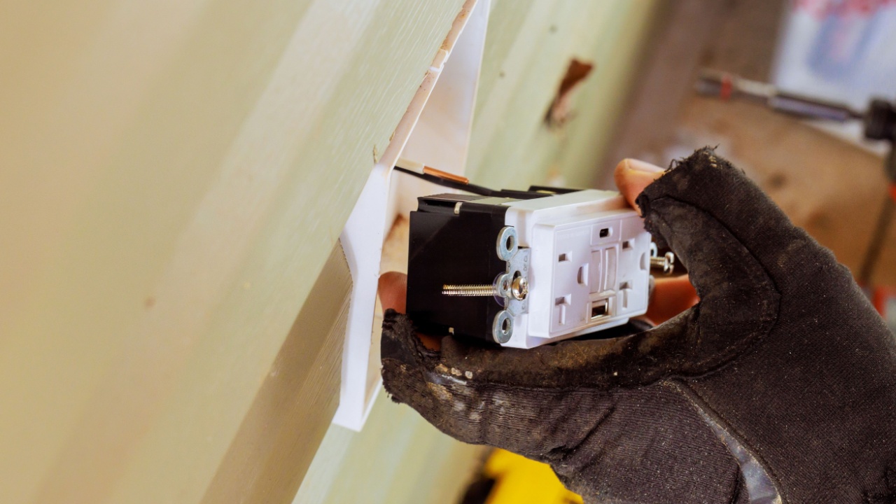 An electrical installation requires meticulous work to connect electrical wires to new outlets