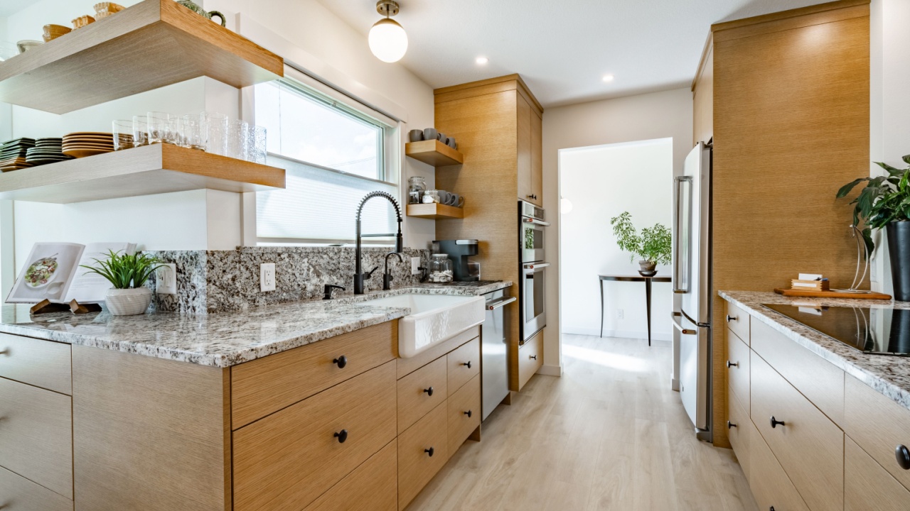 Interior rooms in a modern farmhouse style remodelled home. Residence contains kitchen living room family room bathroom dining room and bedrooms stylishly decorated in a classic style